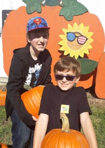 Mrs. Chaltraw's (cute) kids picking out pumpkins at Leaman's